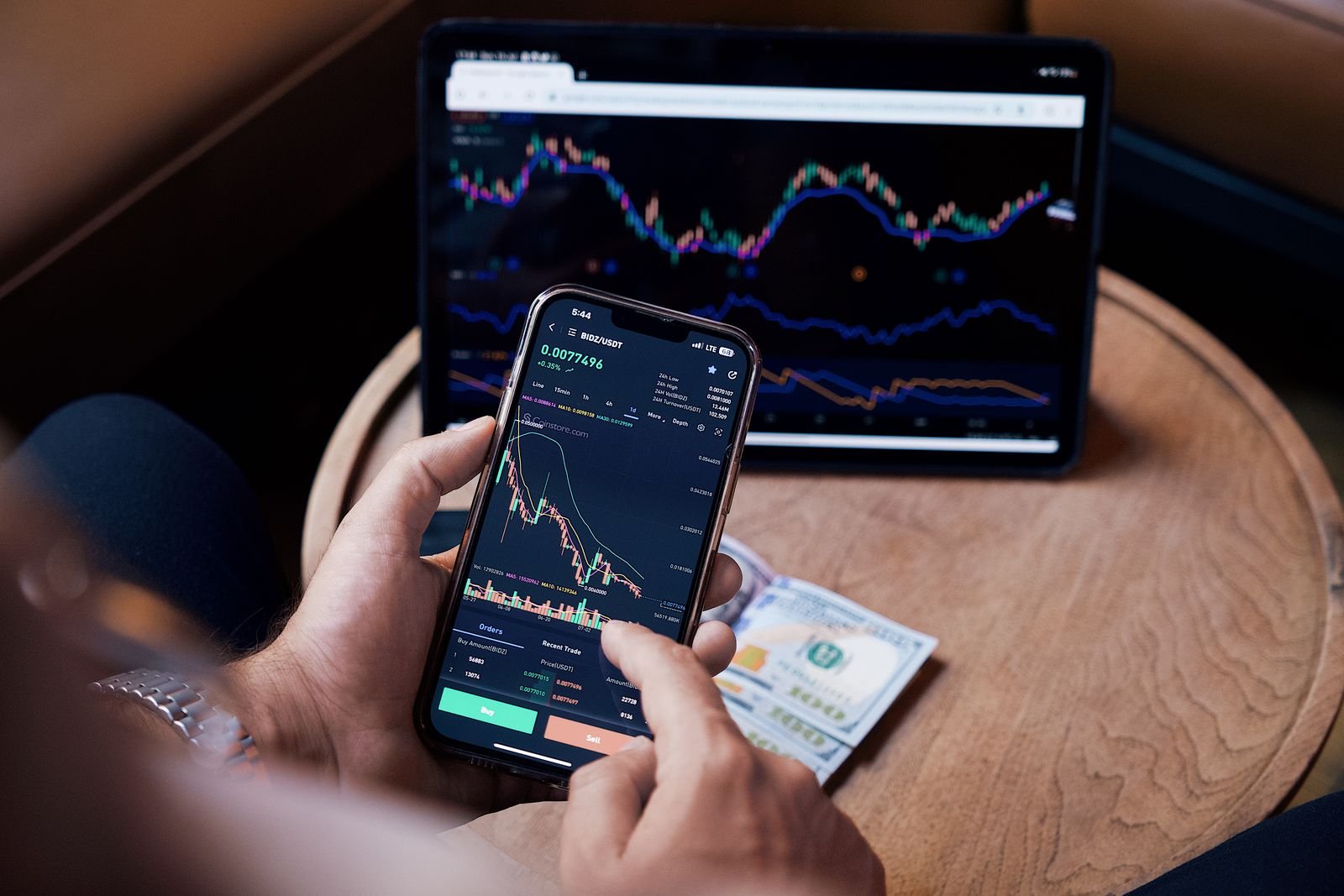 Checking open forex positions on a phone and tablet away from the desk